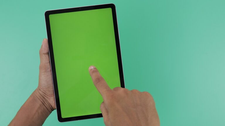 tablet, display, screen, green screen, hands, holding, finger pointing, green sc