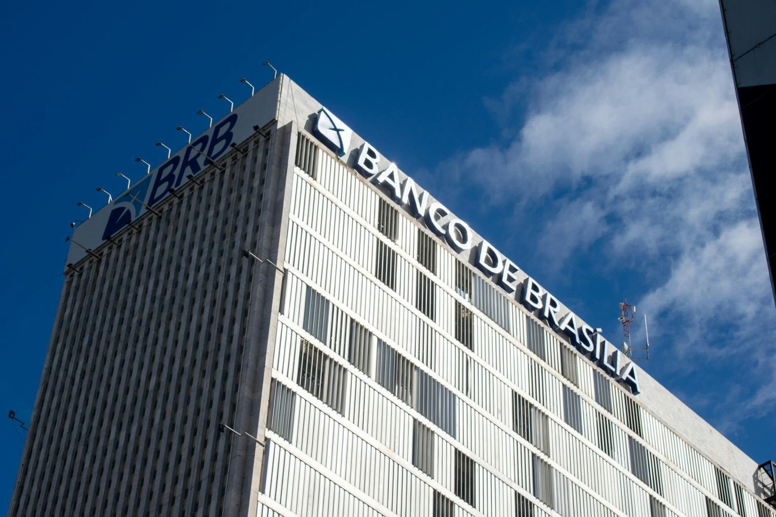 A prominent view of Banco de Brasília building with clear blue sky background in