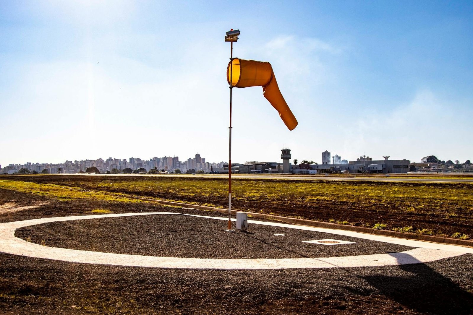 View of a windsock and control tower at Londrina airport highlighting aviation a