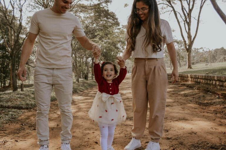 Happy family moment strolling through a park in São Paulo, capturing joy and con