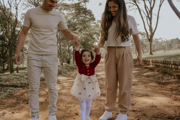 Happy family moment strolling through a park in São Paulo, capturing joy and con