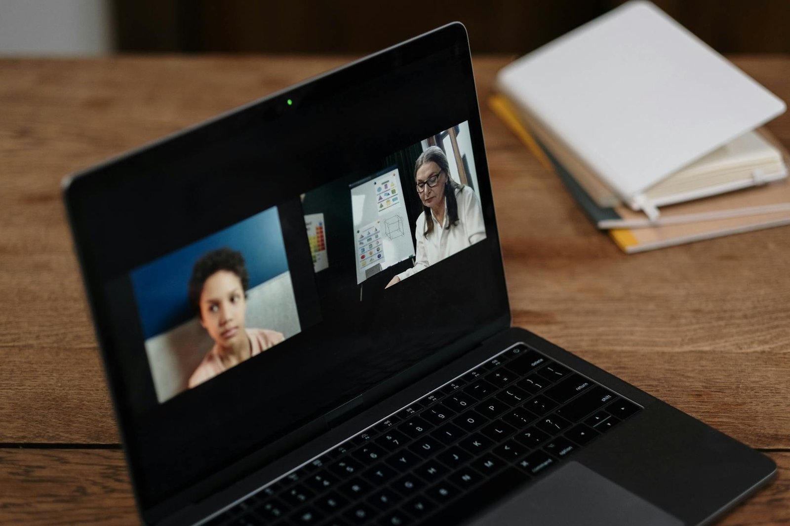 Two people engaging in online education via a laptop, perfect for illustrating v