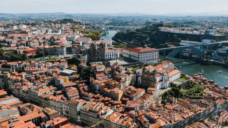 Stunning aerial photograph showcasing the cityscape of Porto, Portugal with the 