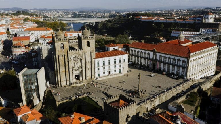 A stunning aerial shot of Portos historic Sé Cathedral and surrounding areas at