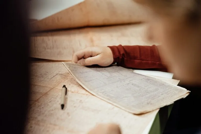 Someone is looking at old paper.