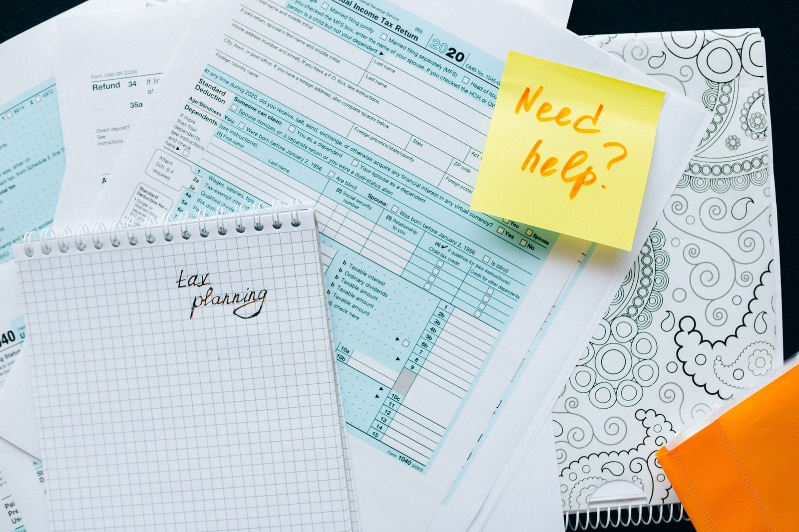 ITCMD: o imposto sobre heranca e doacao no planejamento sucessorio 1 Tax documents and a note suggest tax planning and assistance needs.