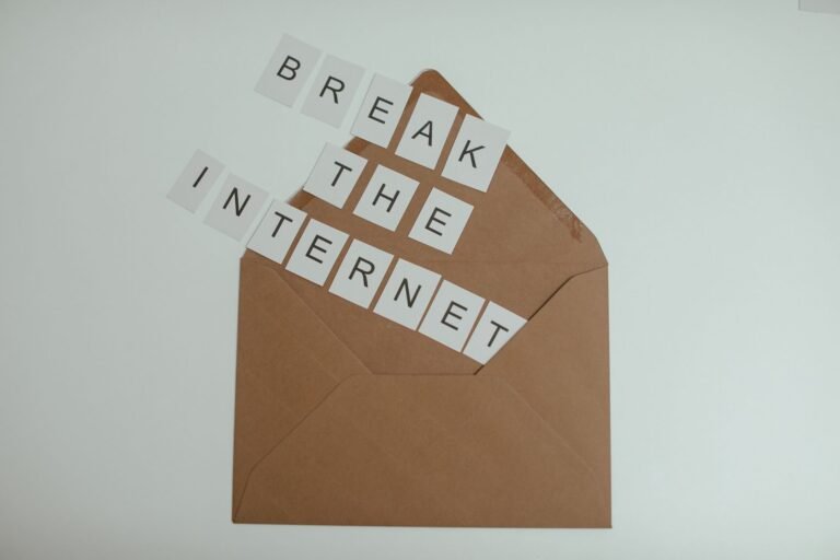 Brown envelope with tiles spelling 'Break the Internet' creates a conceptual and modern th