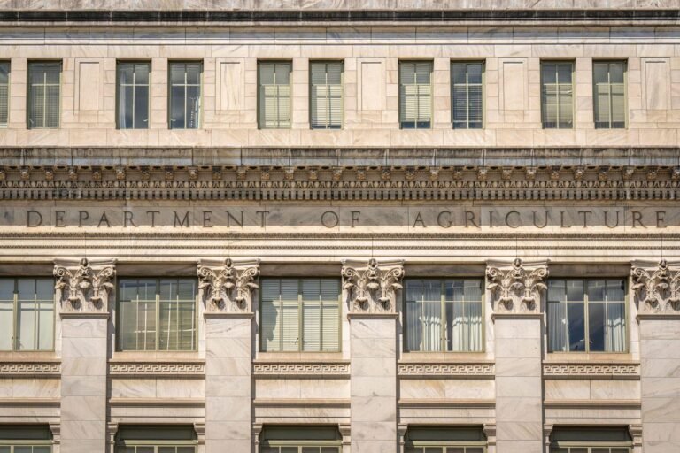 Close-up of the Department of Agriculture building's architectural facade, showcasing intr