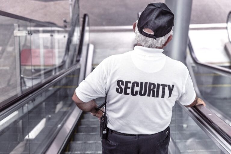 security, man, escalator, police, guard, officer, surveillance, control, monitoring, safety, uniform, back view, securit