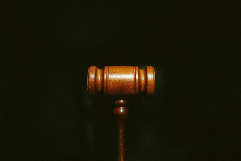 brown wooden stand with black background