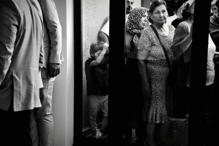 Black and white photo of people in a crowded street in İstanbul, Türkiye.