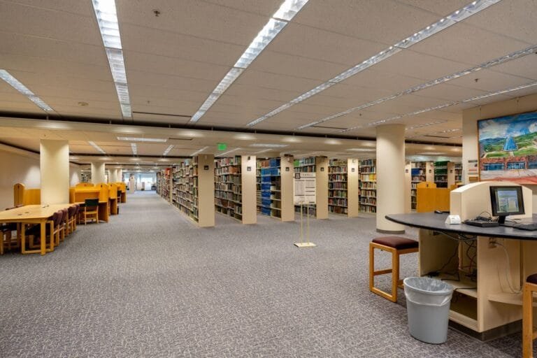 Wide-angle view of a modern library interior at Washington State University, Pullman.