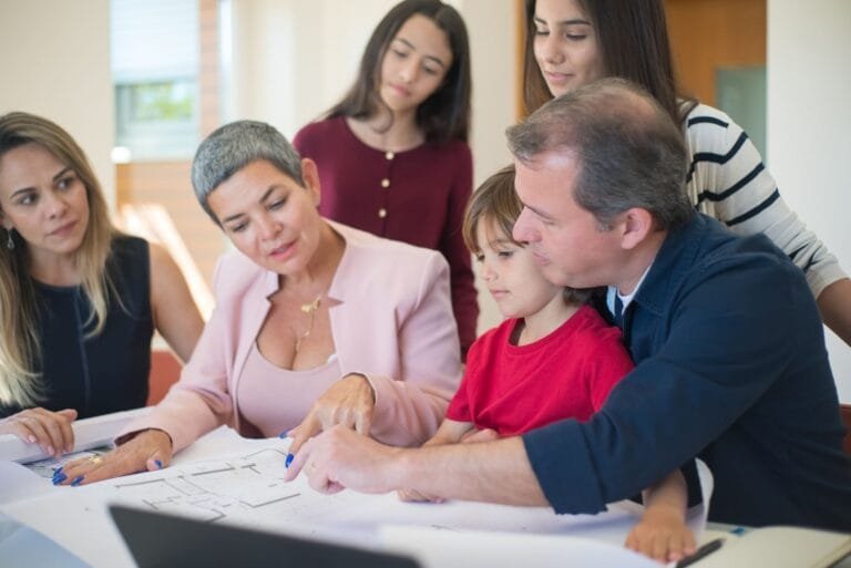 Family meeting with realtor to discuss house plans, emphasizing real estate decision-making.