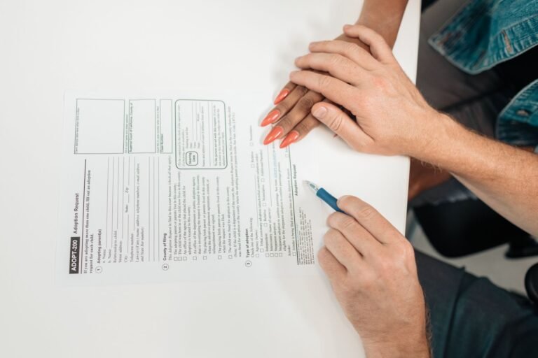 A couple fills out an adoption request form, highlighting commitment and future family pla